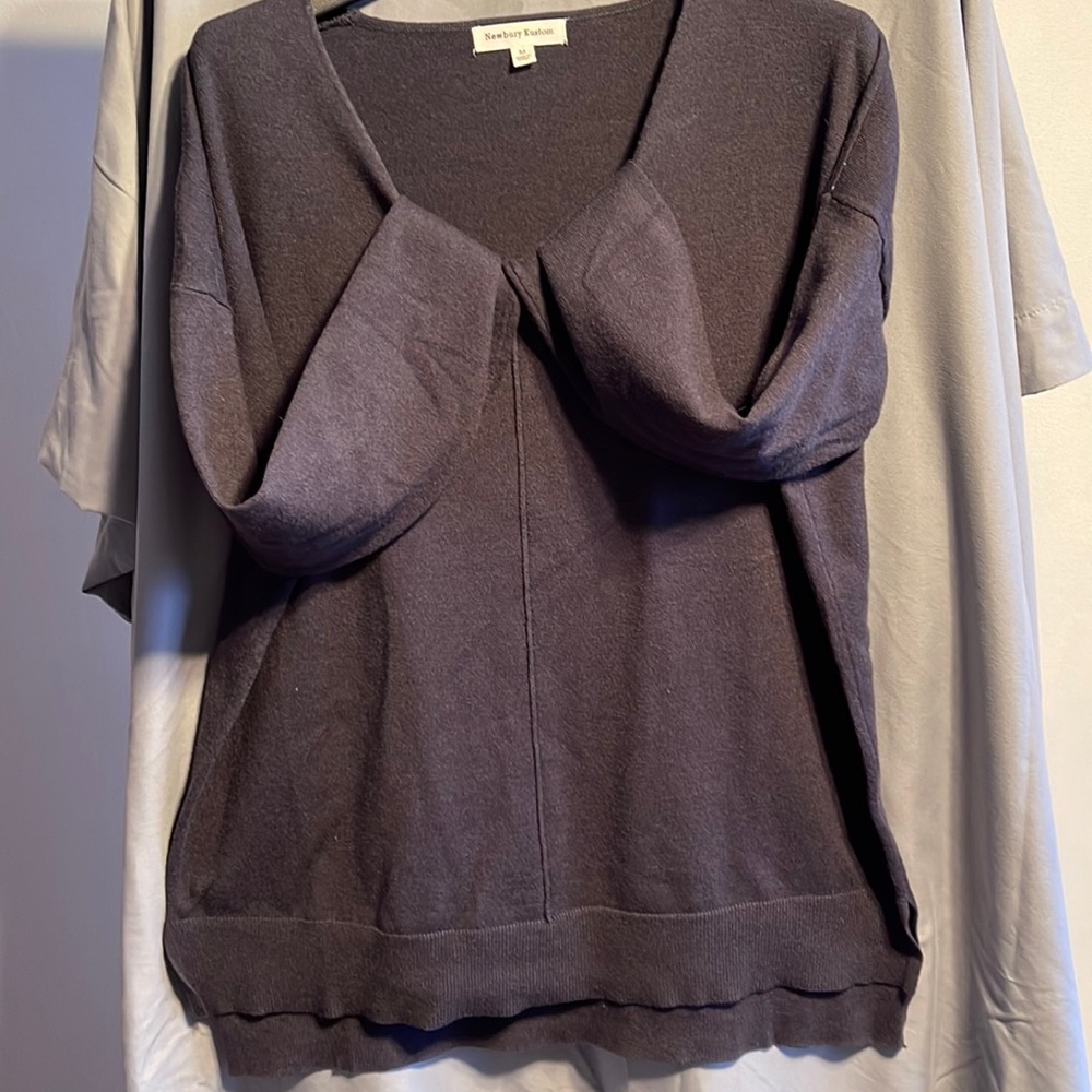 Royal blue V-neck sweater.